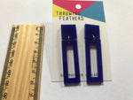 Square & rectangular acrylic earrings in dark blue, size small, with a ruler showing their size