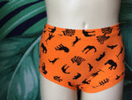 Orange boy-leg plus size briefs with pictures of animals displayed on a mannequin, cotton briefs plussize underwear