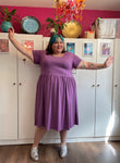 Joanna, a fat babe, wears a purple dress