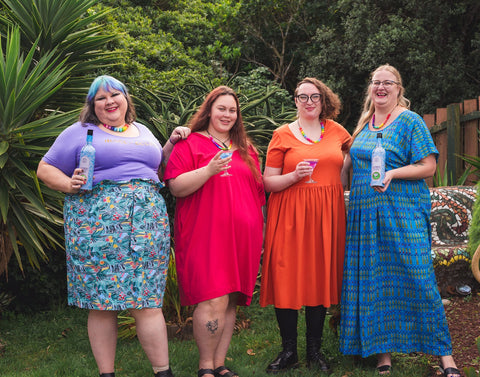 Joanna and some other fat babes wear House of Boom clothing and hold the gin
