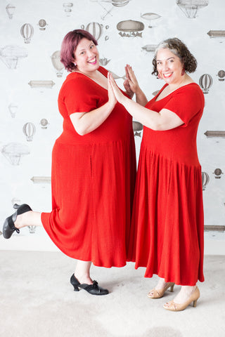 Carma and Kris in red dresses