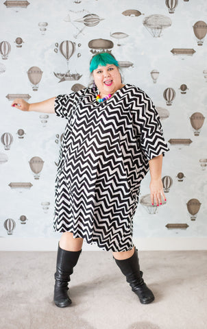 Joanna in a zig zag cotton plus-size sack dress with pockets
