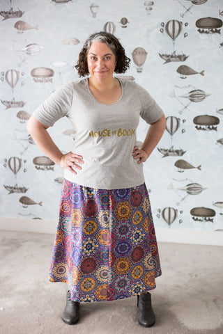 Woman in a purple plus-size skirt